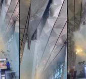 Şiddetli yağış y&uuml;z&uuml;nden havalimanı &ccedil;atısı &ccedil;&ouml;kt&uuml;