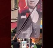 Yeni parti binasında Atat&uuml;rk posterindeki Altıok amblemine bı&ccedil;akla kestiler