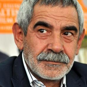 Turgay Tan&uuml;lk&uuml; kimdir? Aslen nerelidir ka&ccedil; yaşındadır?