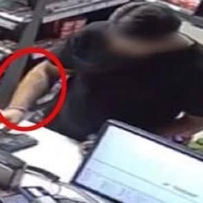 Dolandırıcılık şüphelisi, kolundaki dövmeden yakalandı