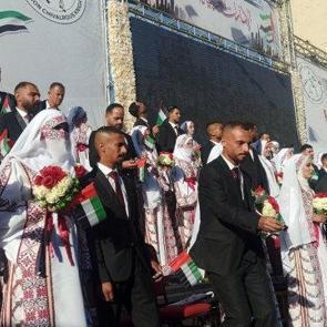 Gazze'de savaşın gölgesinde umut: 54 çift enkazlar arasında evlendi