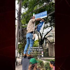 Brezilyalı aktivistten ses getiren eylem: 'İsrail' tabelasını s&ouml;k&uuml;p 'Filistin' yaptı!