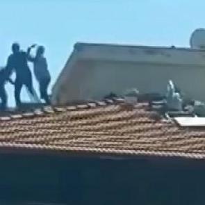 Gaziantep'te bina &ccedil;atısında y&uuml;rekleri ağza getiren kavga