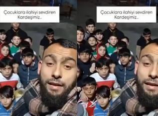 &Ccedil;ocuklara ilahi s&ouml;yleyen Roman genci g&ouml;n&uuml;lleri fethetti!