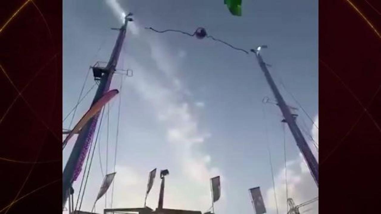 İspanya'daki fuarda düzenlenen eğlence korkuyla son buldu! Dev sapan kopunca ortalık karıştı