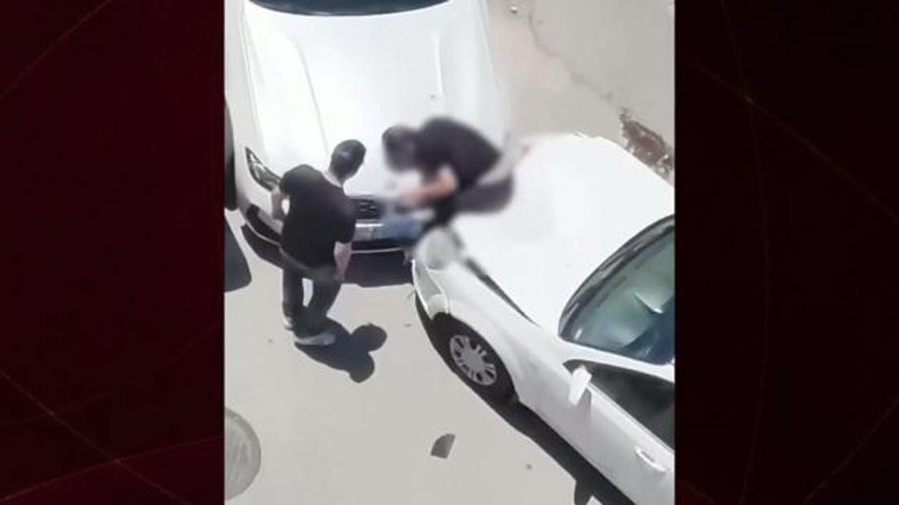 Çin'de yol verme kavgası dehşetle bitti: Sürücüyü aracın kaputuna sıkıştırdı