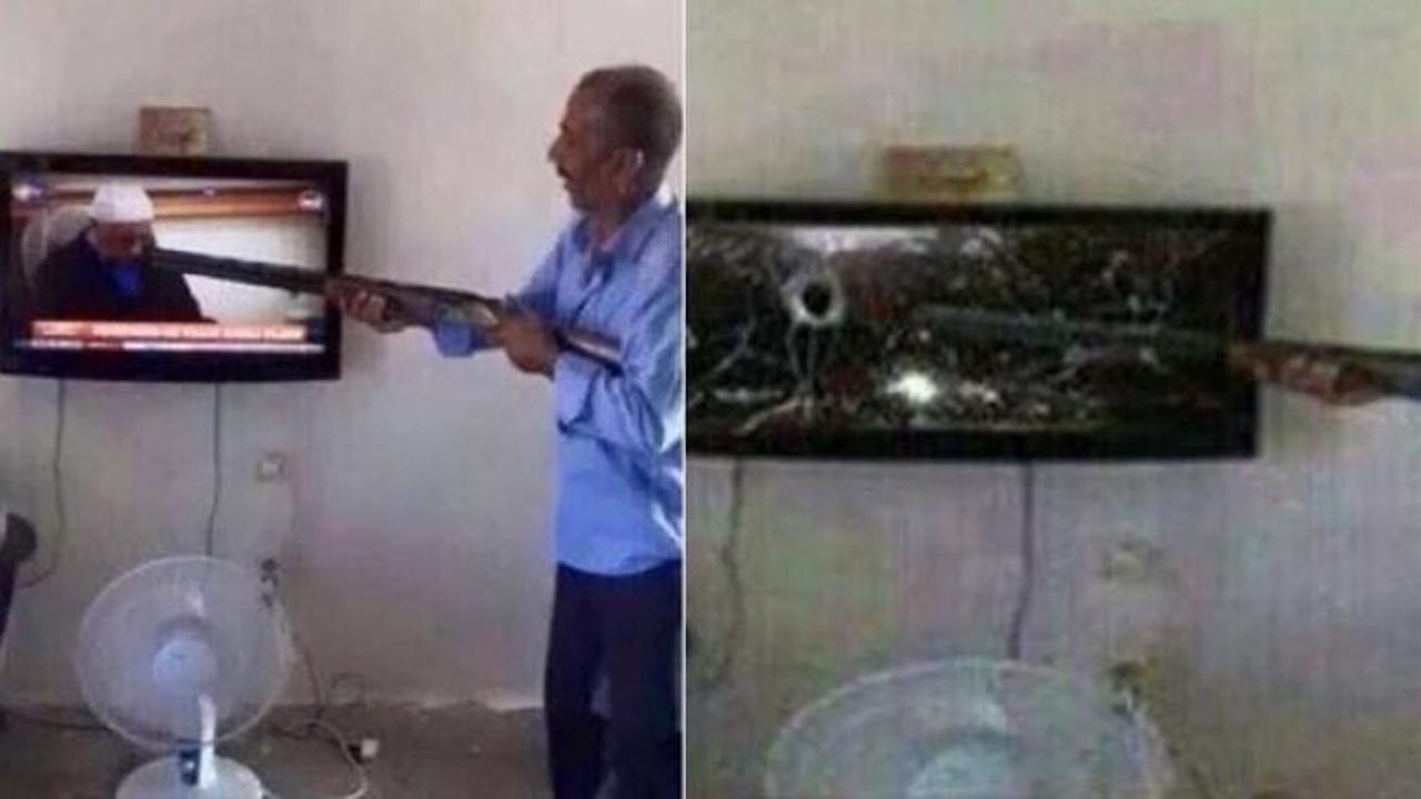 Gülen'i görünce televizyona ateş etti