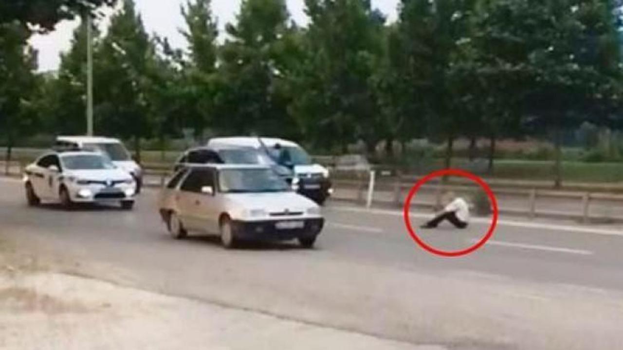 Yolun ortasına oturup 'Ezin ulan' diye bağırdı