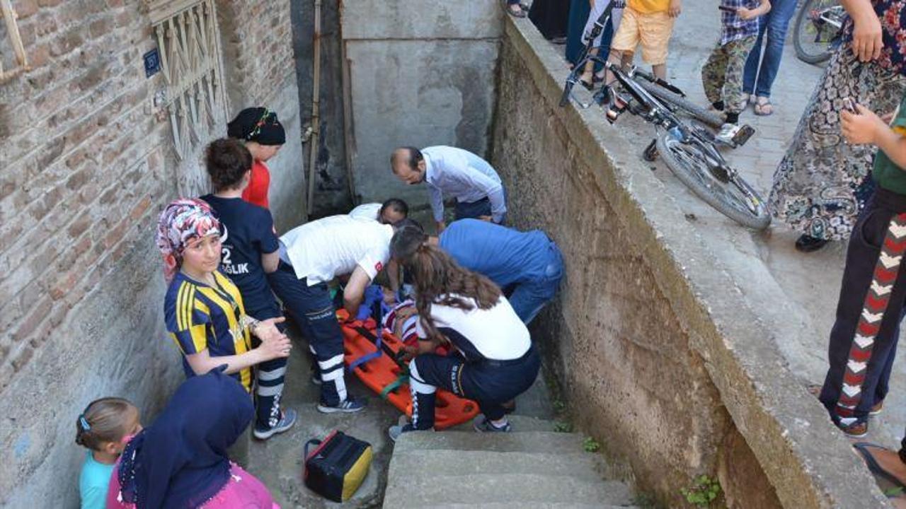 Bisikletle apartman boşluğuna düşen çocuk yaralandı