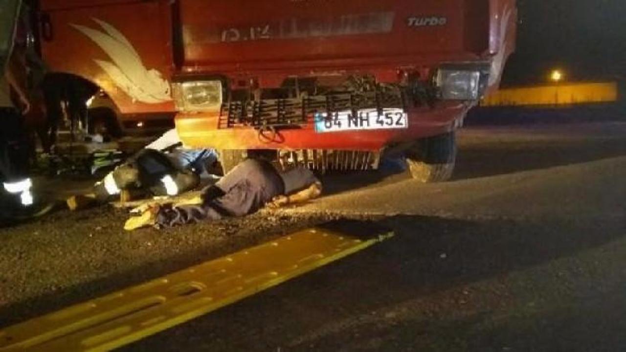 Savrulan kamyonun altına düşen şoför yaralandı