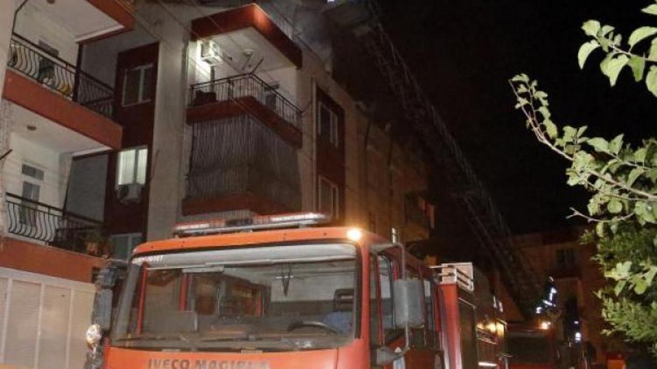 Yangında mahsur kalan çocuğu komşuları kurtardı
