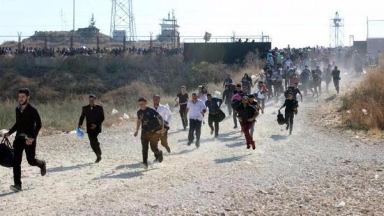 Koşarak ge&ccedil;tiler! Suriye sınırında bayram g&ouml;&ccedil;&uuml;