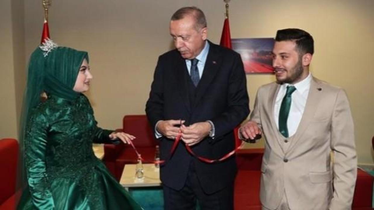 Yüzüklerini Başkan Erdoğan taktı