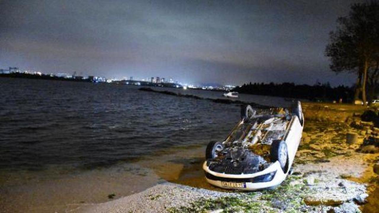 Takla atan otomobil deniz kenarına düştü