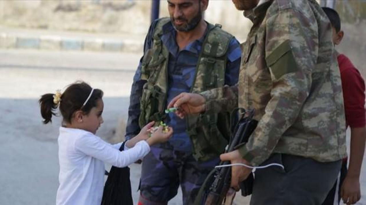 SMO askerleri mutluluklarını çocuklarla paylaştı