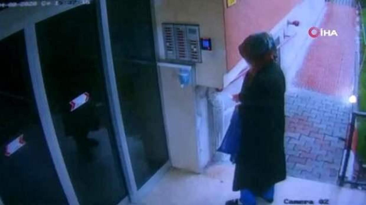 Elindeki sıvıyı asansör ve kapılara süren kadın yakalandı