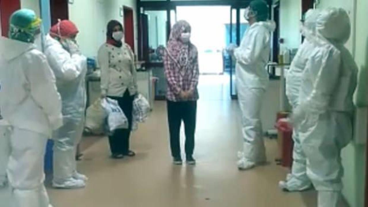 Koronavirüsü yenen çocuk alkışlarla taburcu edildi