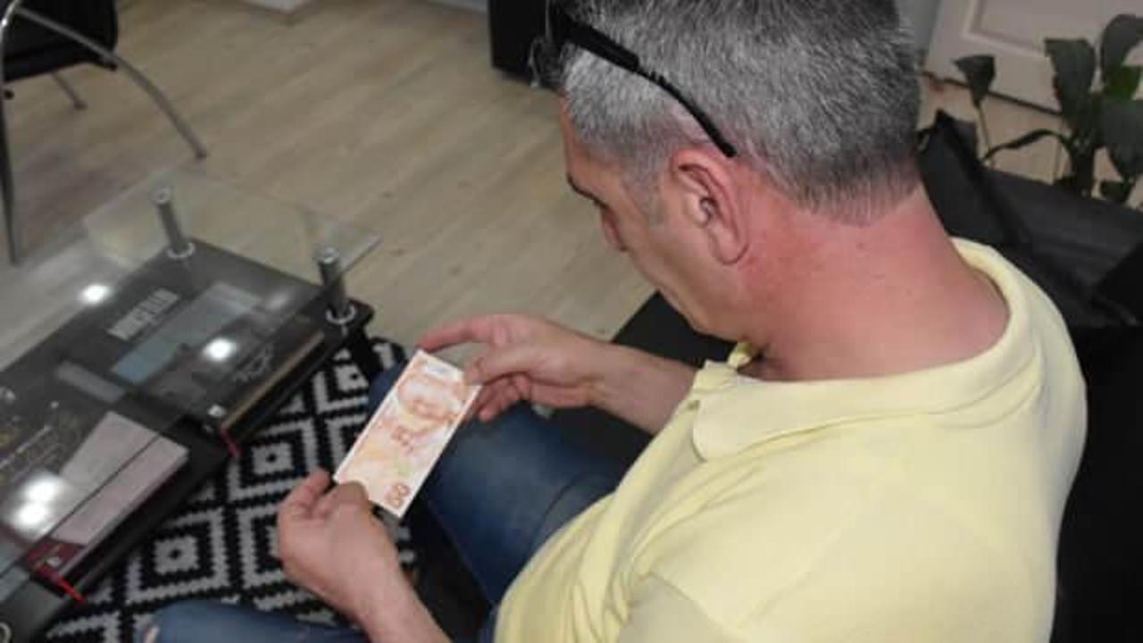 ATM'den çektiği 50 lira baskı hatalı çıktı