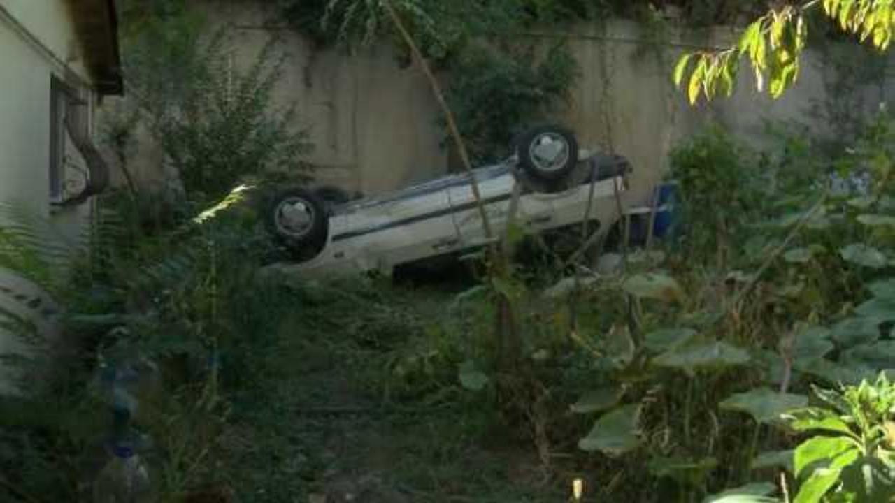 Sarıyer'de otomobil 15 metre yükseklikten evin bahçesine düştü
