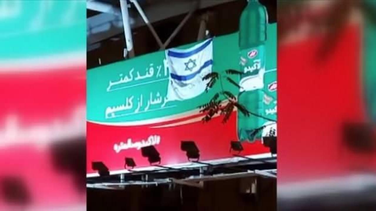 İran'da İsrail bayraklı 'teşekkürler Mossad' yazılı pankart