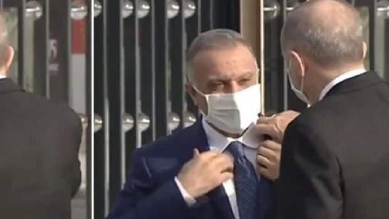 Cumhurbaşkanı Erdoğan, Kazımi'nin yakasını d&uuml;zeltti