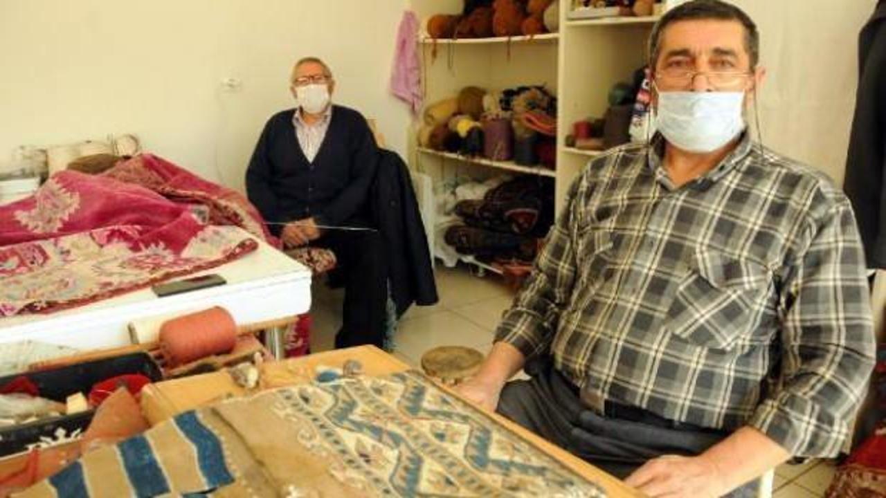 İki kardeş, 52 yıldır eski halılara hayat veriyor