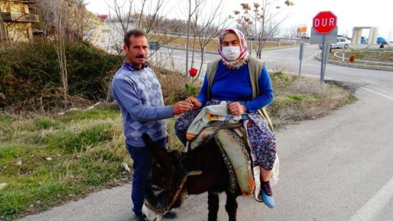 Eşek sırtındaki eşine kadınlar g&uuml;n&uuml; s&uuml;rprizi