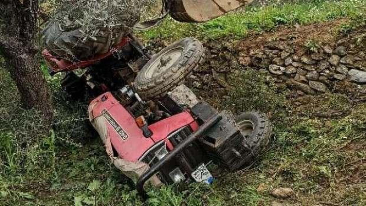 Devrilen trakt&ouml;r&uuml;n altında kalarak &ouml;ld&uuml;