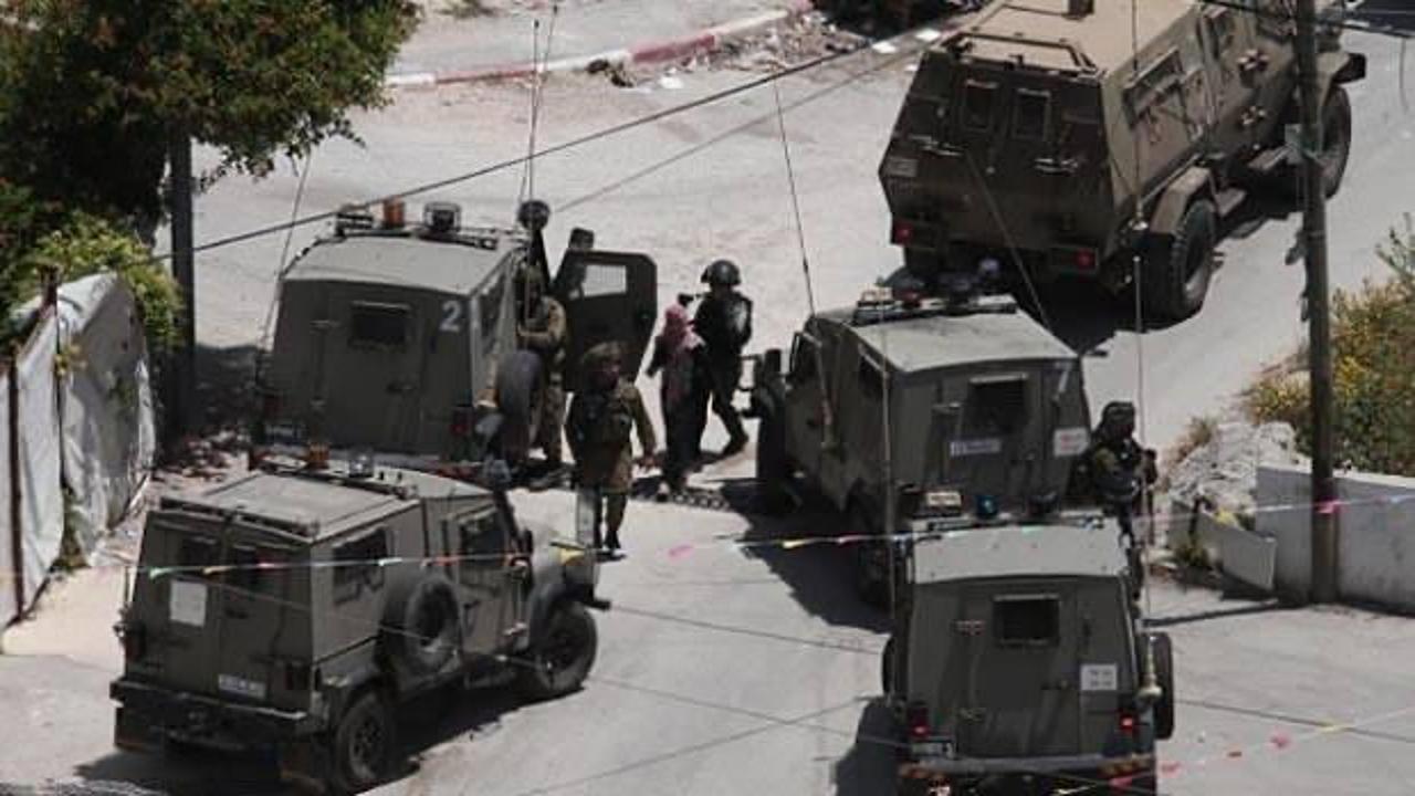 İsrail güçleri 13 Filistinliyi gözaltına aldı