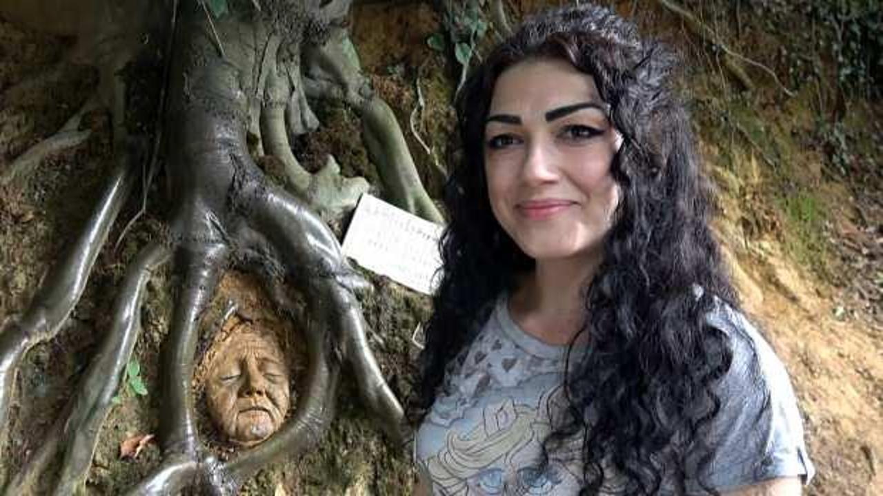 G&ouml;renler şok oluyor! Ağa&ccedil; k&ouml;klerini sanat eserine &ccedil;evirip bir de not bırakıyor