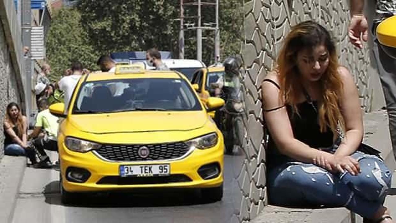 Taksim'de kadın turist taksiciyle kavga ederek sinir krizi geçirdi, taksiyi yumrukladı!