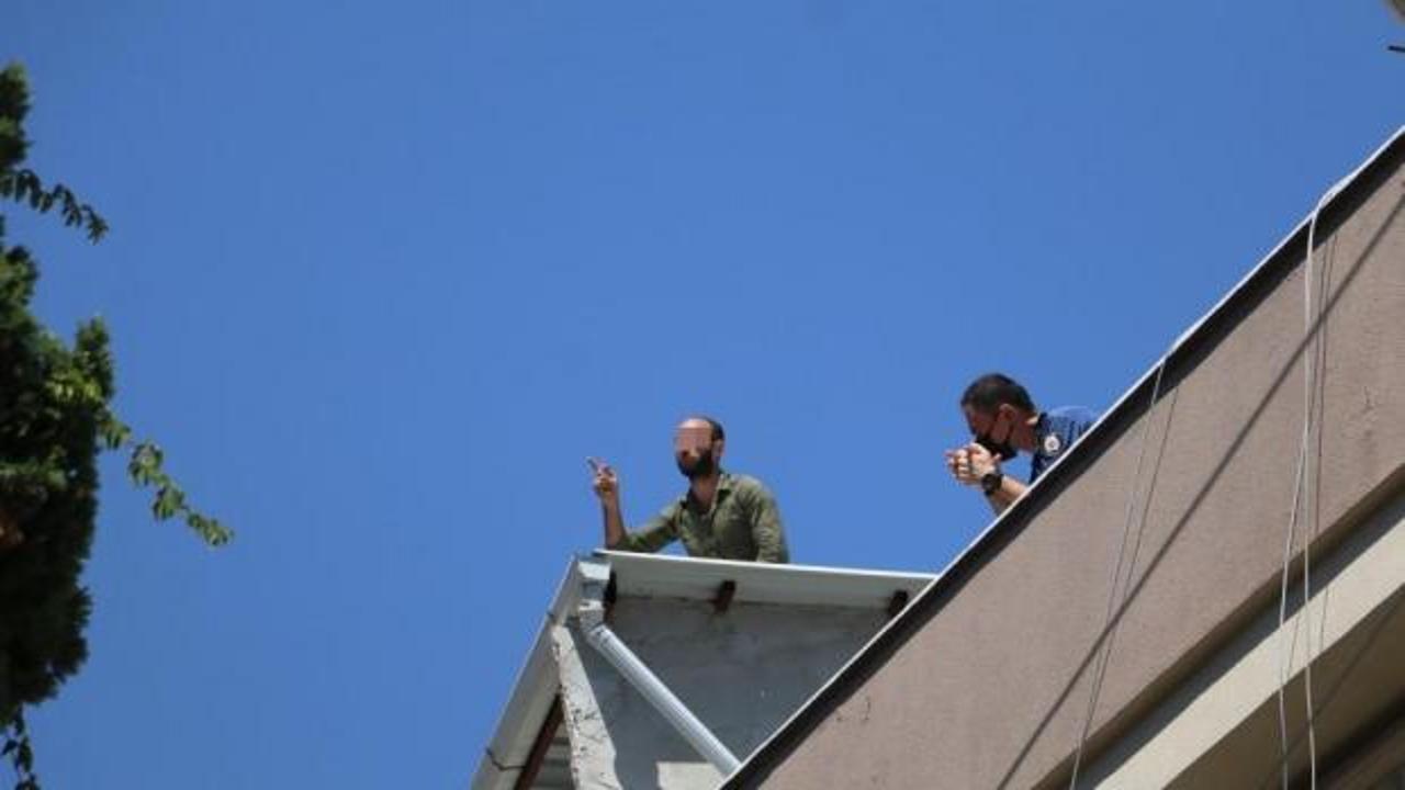 Antalya'da temaslı şahıs çatıda polise ecel terleri döktürdü 