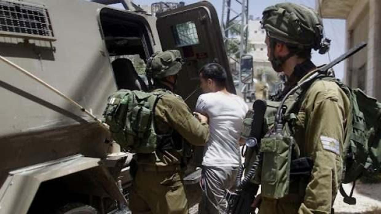 İsrail güçleri biri çocuk 14 Filistinliyi gözaltına aldı
