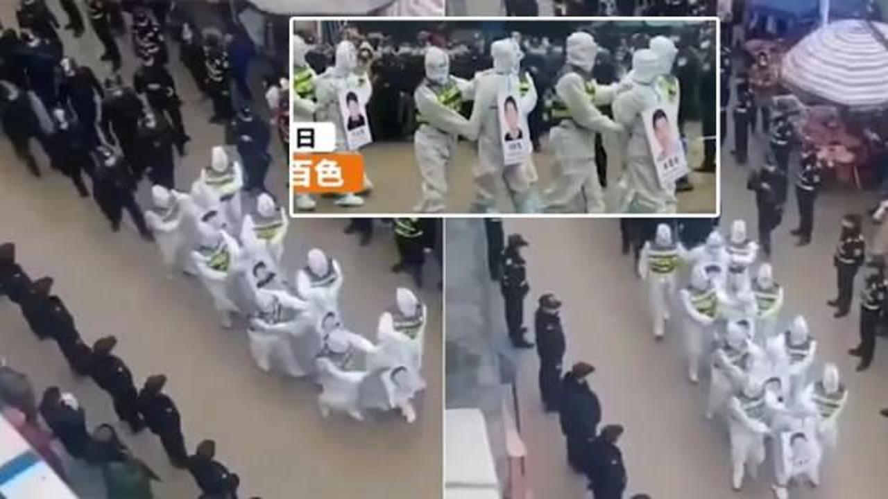 &Ccedil;in'den Kovid-19 &ouml;nlemlerini ihlal edenlere insanlık dışı uygulama