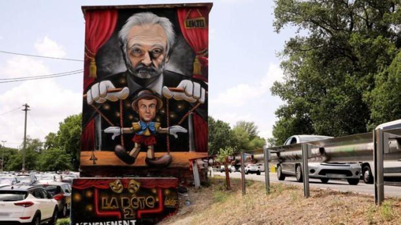 Macron'u Pinokyo olarak gösteren grafiti kaldırıldı