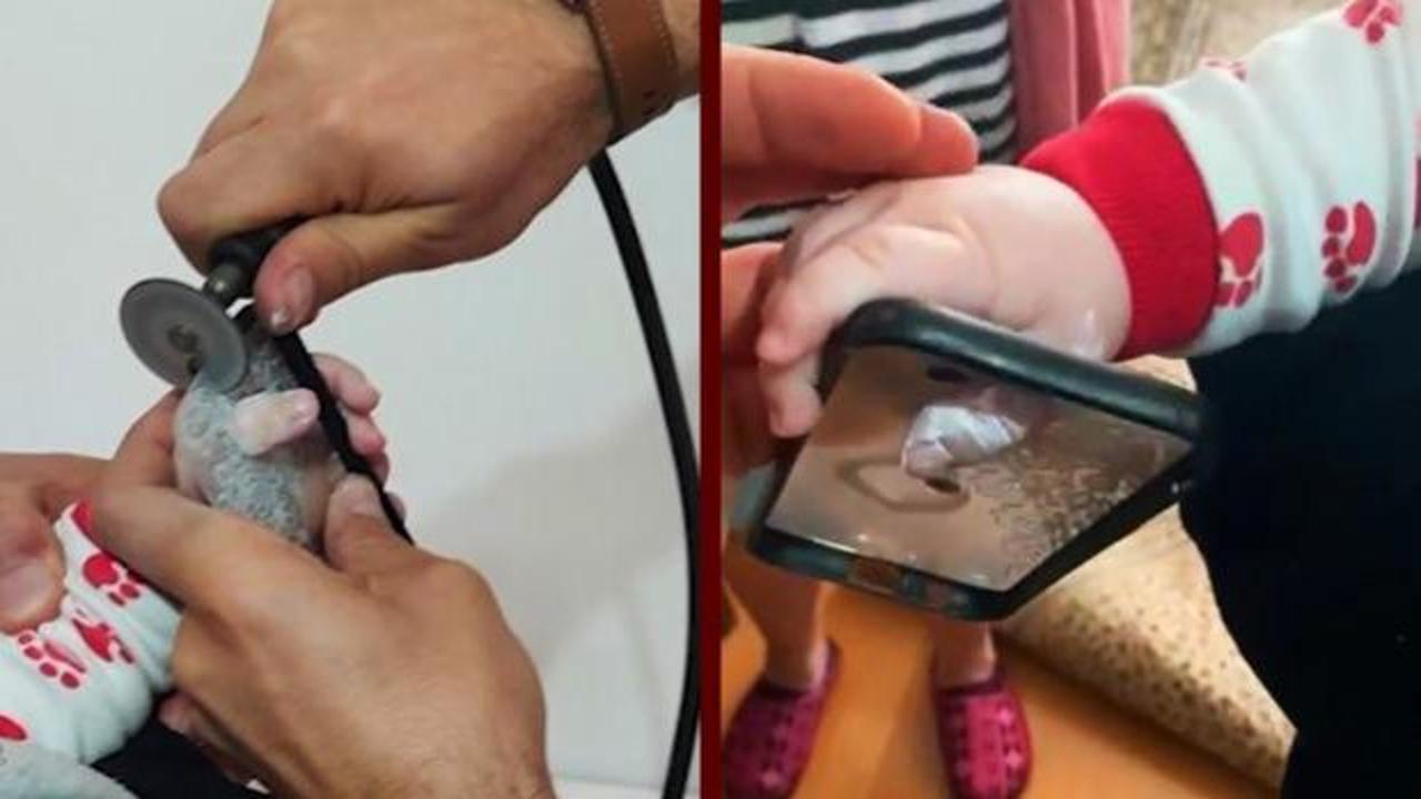 Kocaeli&rsquo;de şaşkına &ccedil;eviren olay! Bebeğin parmağı telefonun kabına sıkıştı 