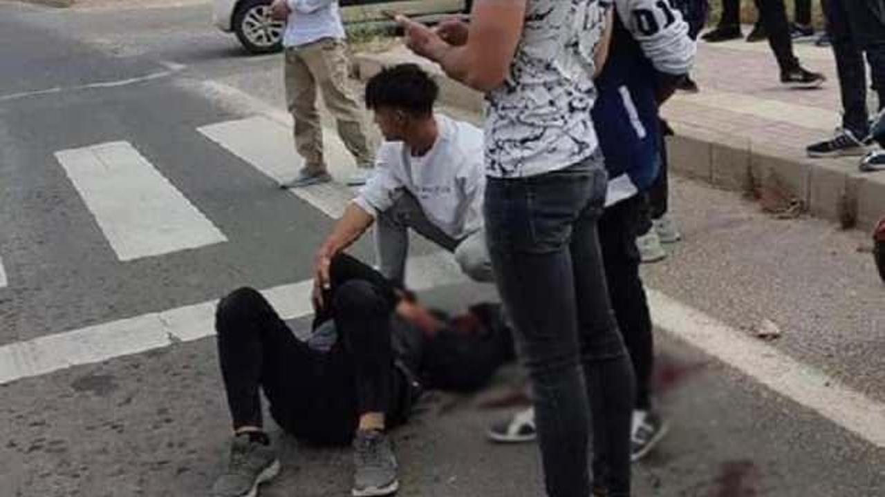 Işıkta bekleyen liseli genci parke taşı ile &ouml;ld&uuml;rd&uuml;ler