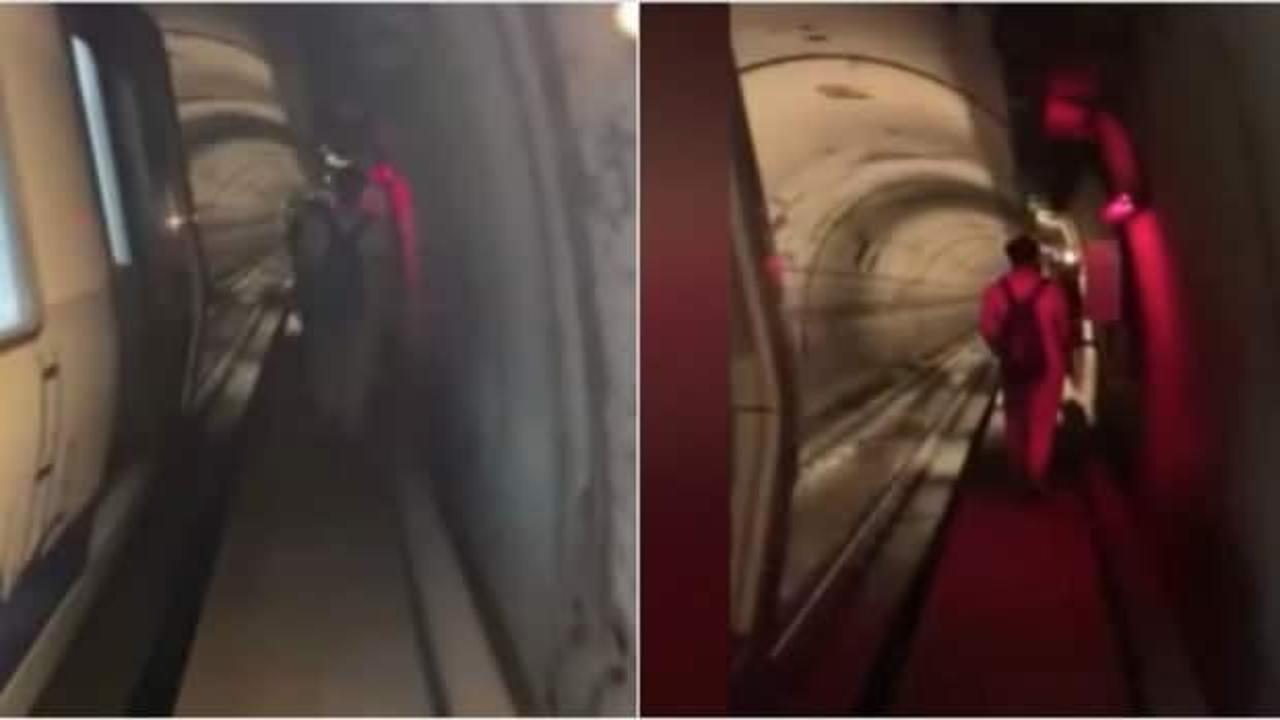 İstanbul'da metro hattındaki arıza nedeniyle yolcular raylarda y&uuml;r&uuml;d&uuml;