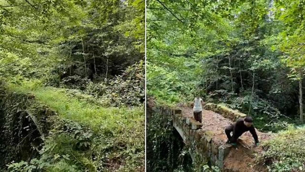 Baba-kız, 1,5 asırlık kemer köprüyü sarmaşık ve otları temizleyerek ortaya çıkardı