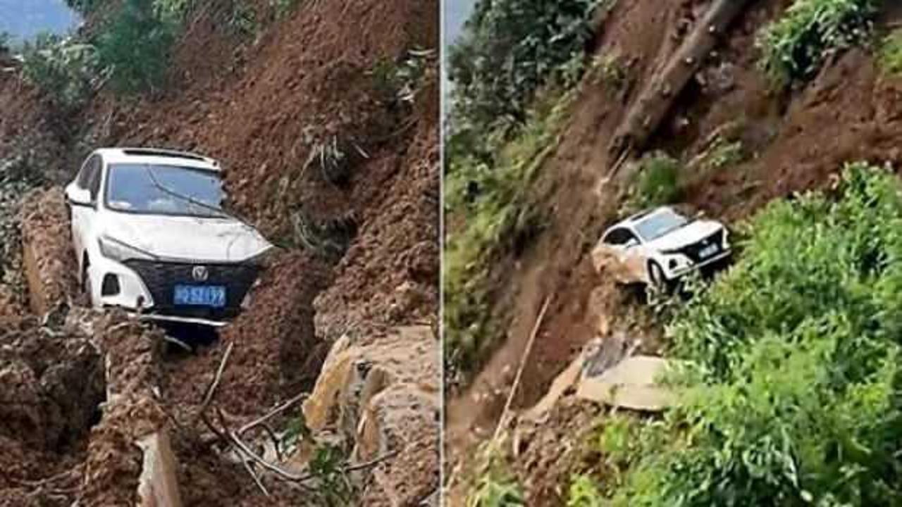 Ölümden saniyelerle kurtuldular: Heyelan otomobili böyle yuttu!