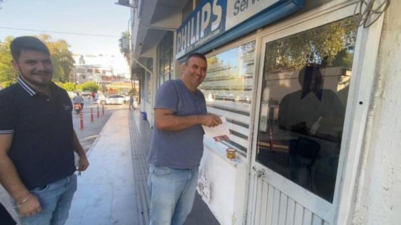 Antalyalı esnaf, kapıya konan "siftah zarfıyla" şaşkına d&ouml;nd&uuml;