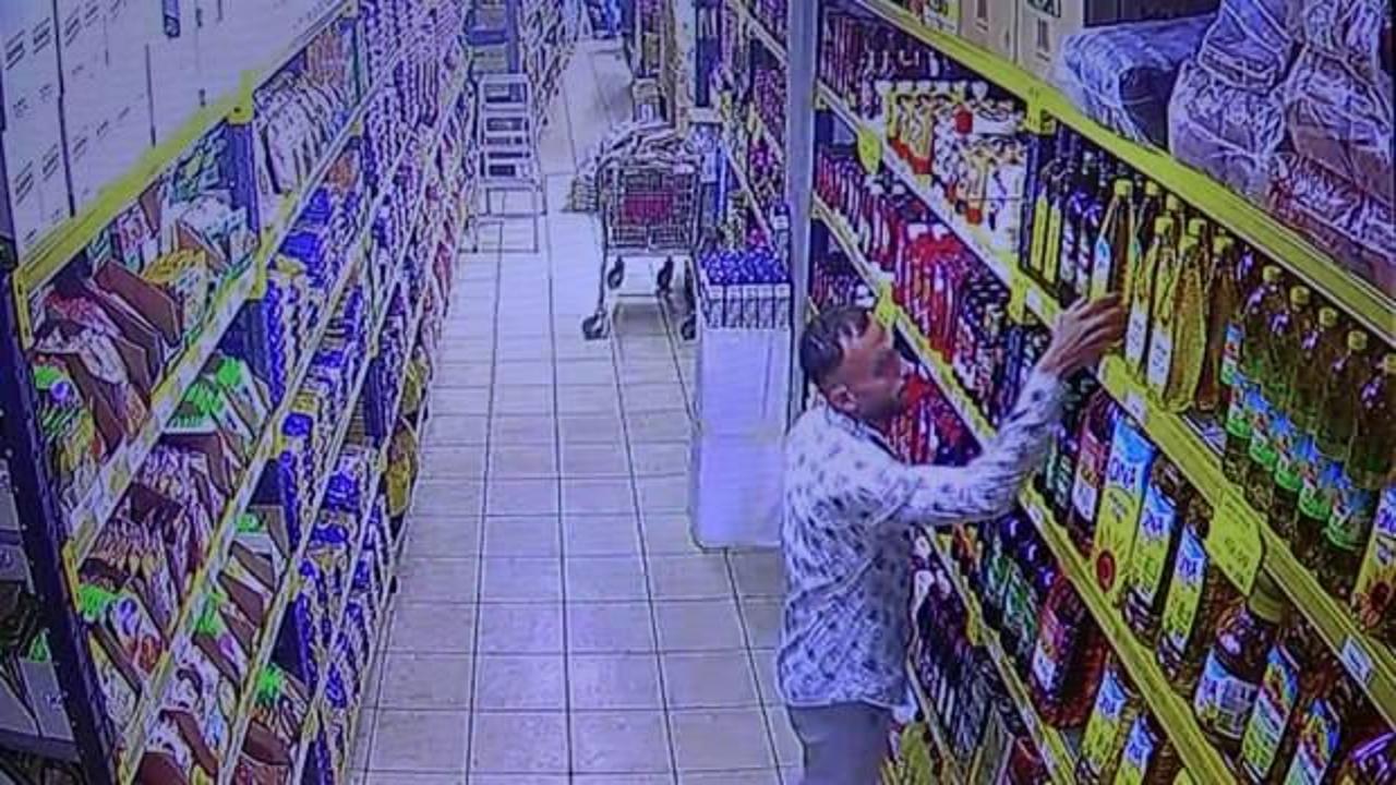 Adana&rsquo;da ilgin&ccedil; hırsızlık: Ay&ccedil;i&ccedil;ek yağını pantolonunun i&ccedil;ine saklayarak &ccedil;aldı! 