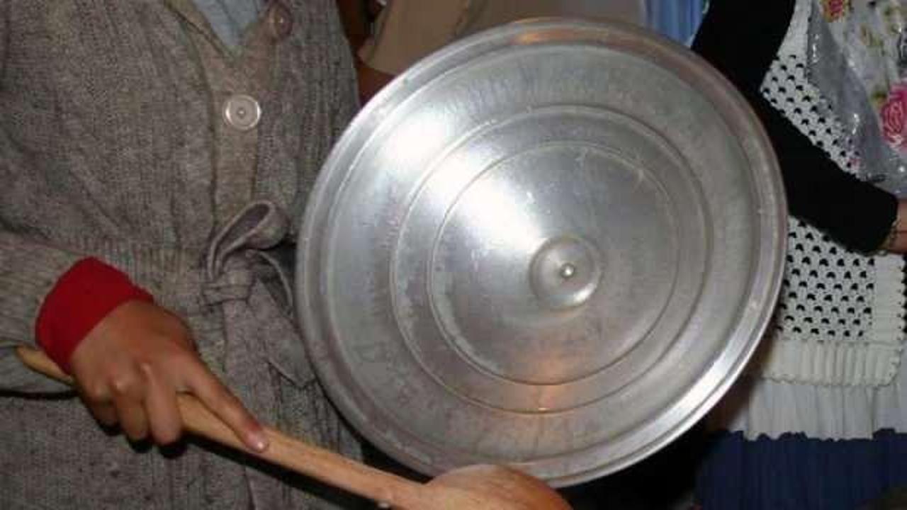 Kadının kocasına attığı tencere kapağı 'silah' sayıldı