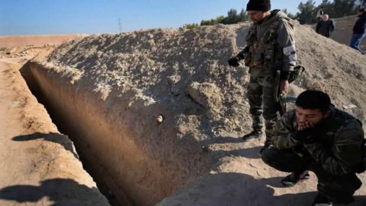 Suriye'deki toplu mezarlar kan dondurdu! Esed'in &ouml;l&uuml;m makinesi olduğu kanıtlandı!