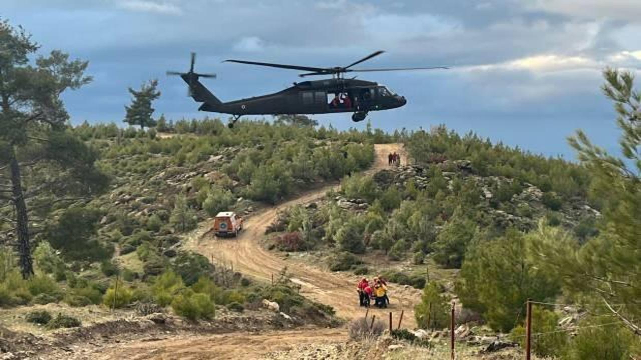 Aydın'da u&ccedil;uruma d&uuml;şen motosiklet s&uuml;r&uuml;c&uuml;s&uuml;, helikopterle kurtarıldı