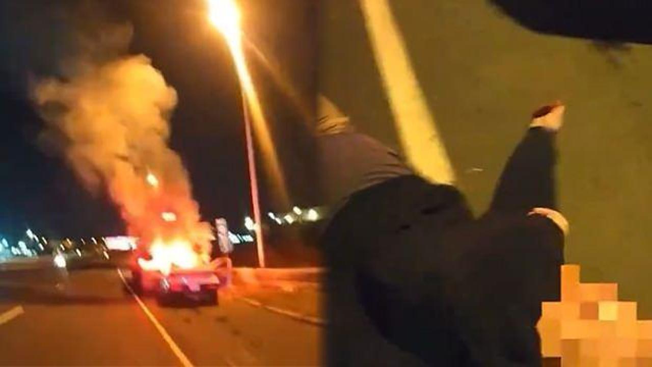 ABD'li polis alevlerin i&ccedil;ine dalıp s&uuml;r&uuml;c&uuml;y&uuml; son anda kurtardı!