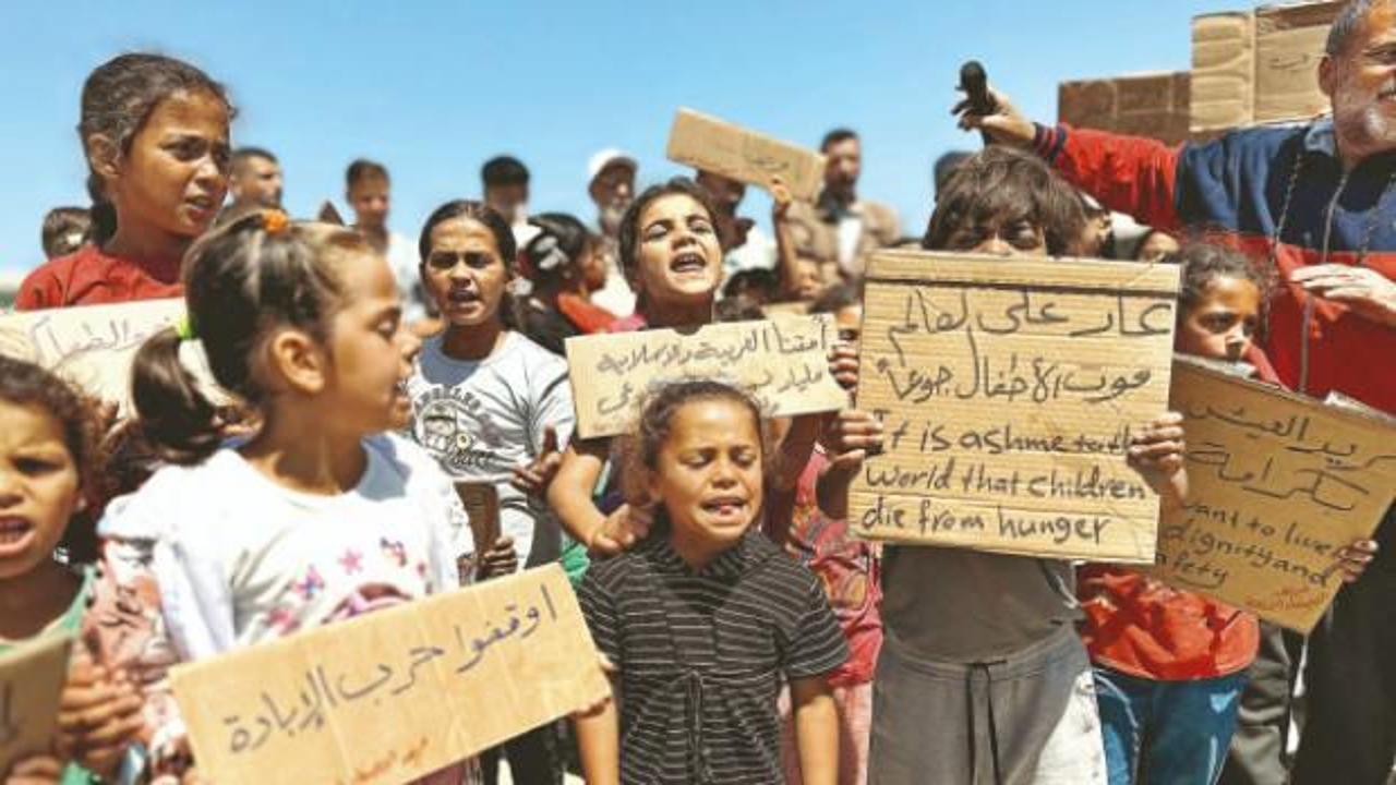 &Ccedil;ocuklardan d&uuml;nyaya "a&ccedil;lıktan &ouml;l&uuml;yoruz" mesajı