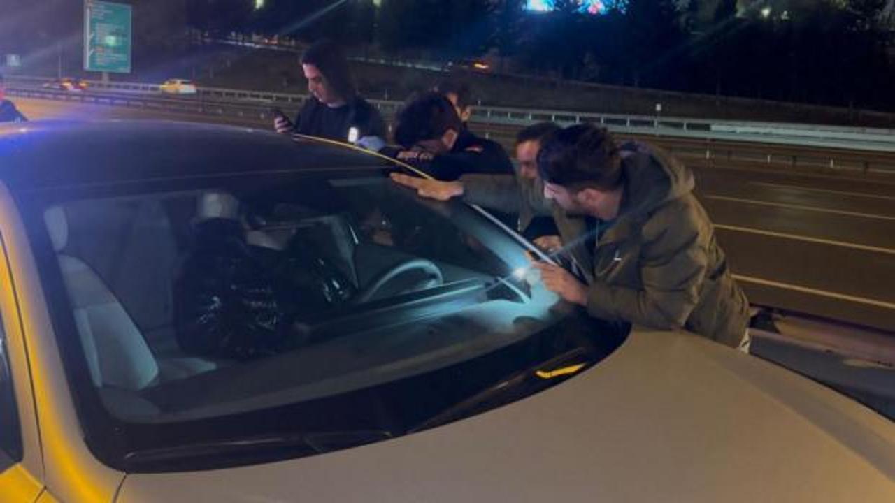 Aracını TEM'in ortasına çekip uykuya daldı! Camı baltayla kırıldı