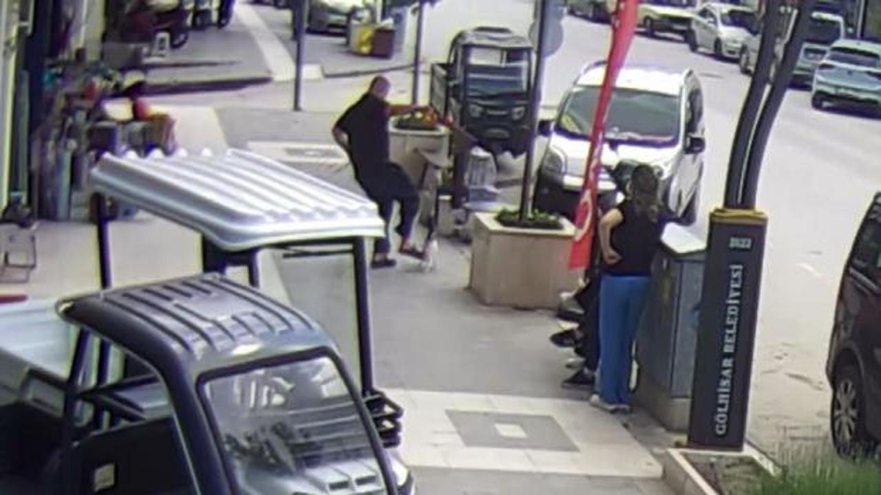 Gölhisar'da Köpeğine Saldıran Kediye Tekme Atan Sahibi Güvenlik Kamerasında Görüntülendi