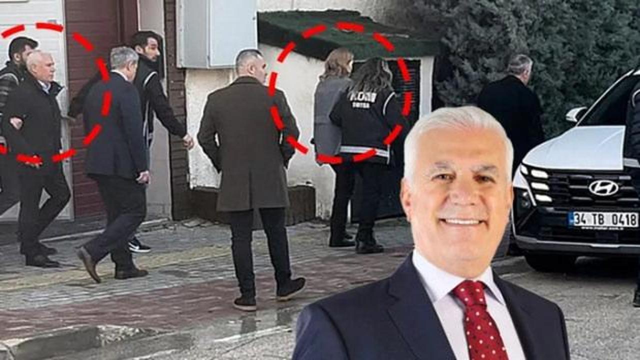 Bursa'da eski bir belediye binası önünde polis ekiplerinin inceleme yapması.